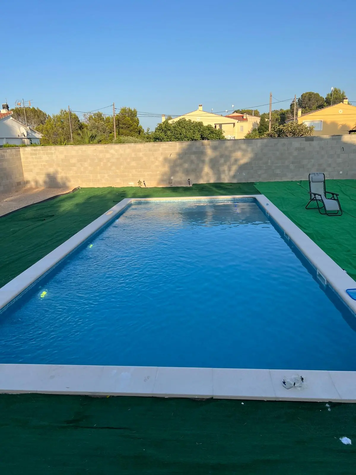 Piscina de obra con mosaico: después